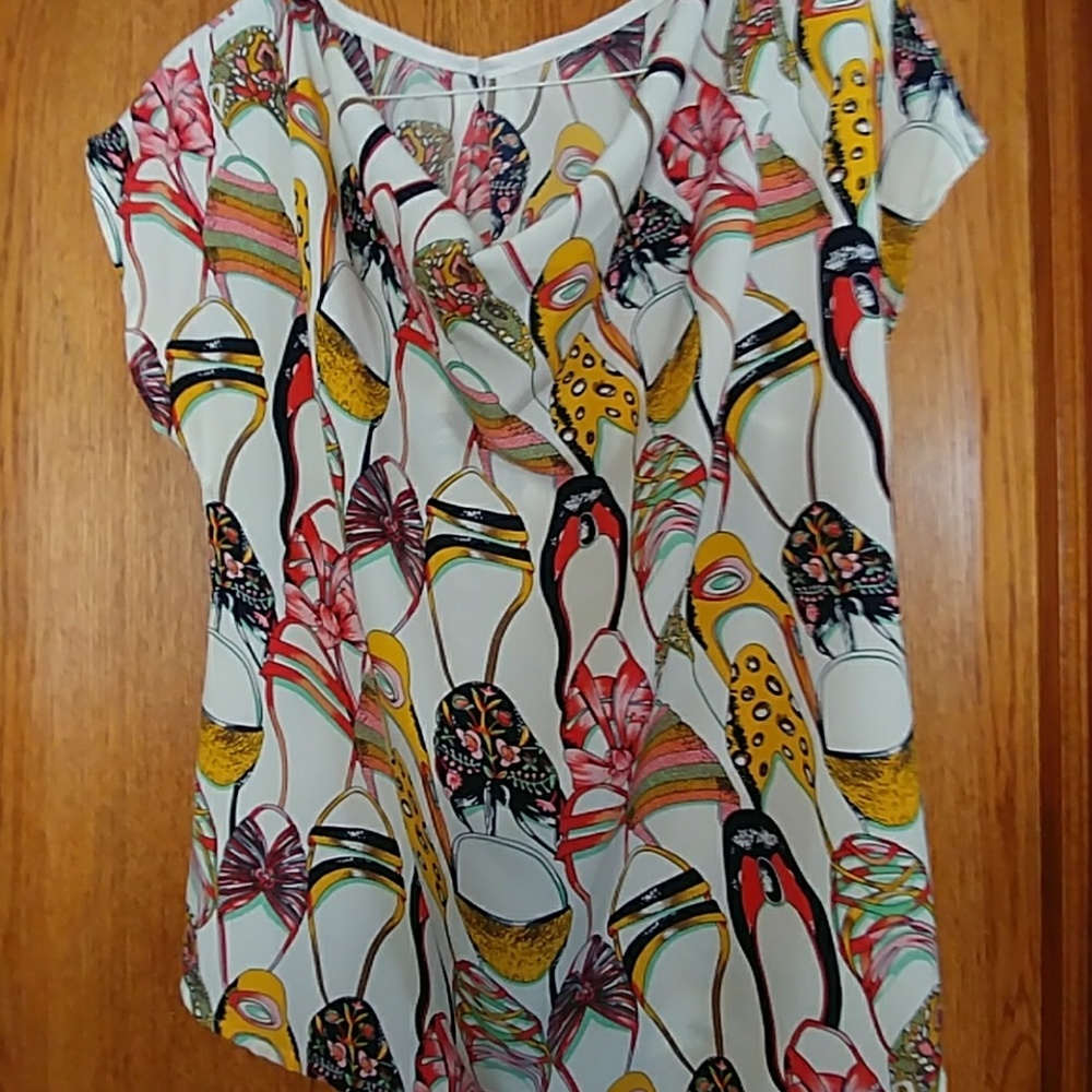 Shoe covered drop neck blouse